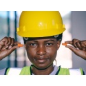 canva-construction-worker-putting-earplugs-on-her-ears-maeicgfy1lo