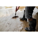 canva-crop-workman-in-rubber-boots-priming-concrete-floor-maenbcmrv-c